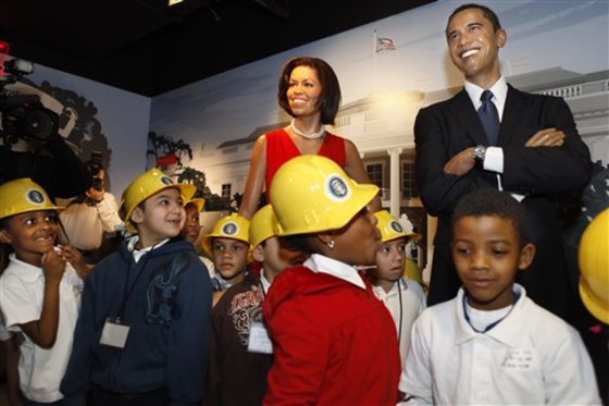 First graders from Cleveland Elementary look at wax figures of first lady Michelle Obama and President Barack Obama at Madame Tussauds in Washington, on Feb. 16. The attraction plans to open a new gallery featuring all 44 American president figures in the fall of 2010. 